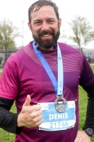 an smiles and gives a thumbs up to the camera