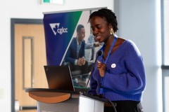 Vanessa Ntinu (she/her), speaks during the 2024 Canadian Gay Lesbian Chamber of Commerce’s 2SLGBTQI+ Business Symposium.