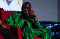 A man speaks on stage